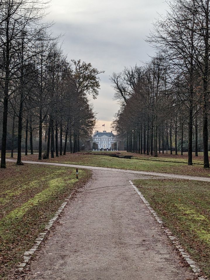 Looking down a long garden path towards Paleis Het Loo