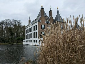 Kasteel Renswoude, a 14th century castle, with a moat and pond, a dovecote and gardens on its estate.