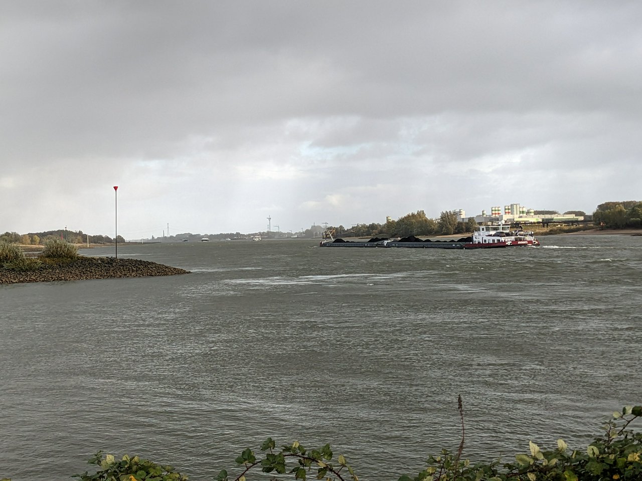 Rhinebarge (but on the Waal, so Waalbarge?) in rainy weather.