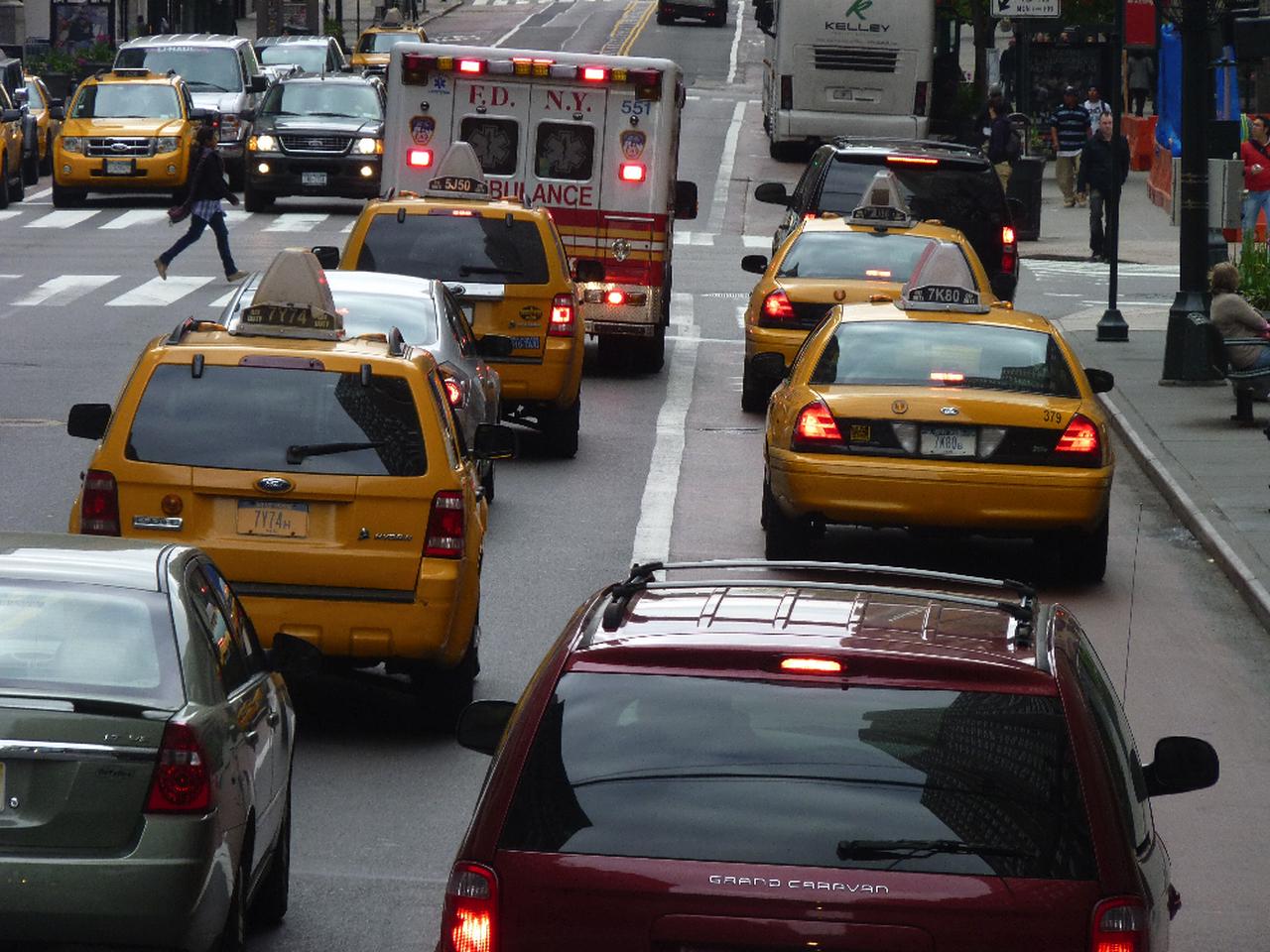 Ambulance and cars on a street in New York