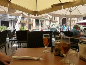 At a bar infront of the Malaga Cathedral