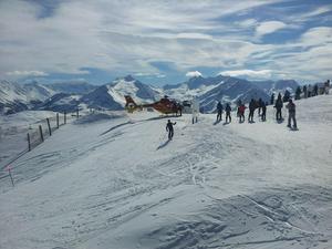 Emergency helicopter landed for injured skier