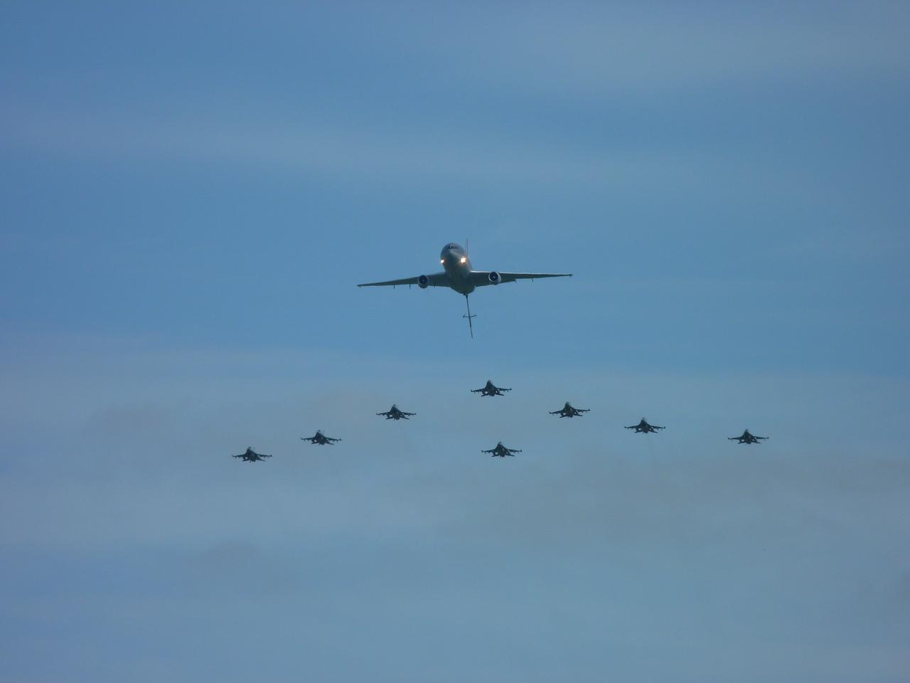 KDC-10 and F-16s in flying formation