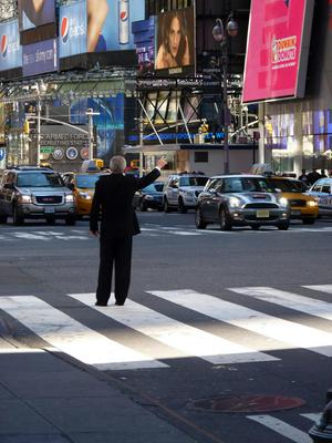 Random man hailing a cab